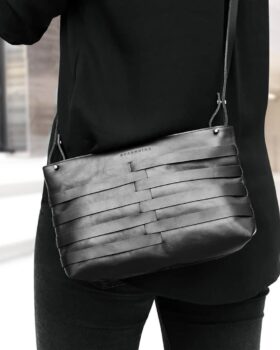 FINA MESH
My current favorite bag when it comes to not taking too many (but also not too few) things with me. The handle is adjustable in length or completely detachable, and it is securely closed by a unique metal zipper with black & silver teeth. I wear it as an evening bag as well as for city tri...