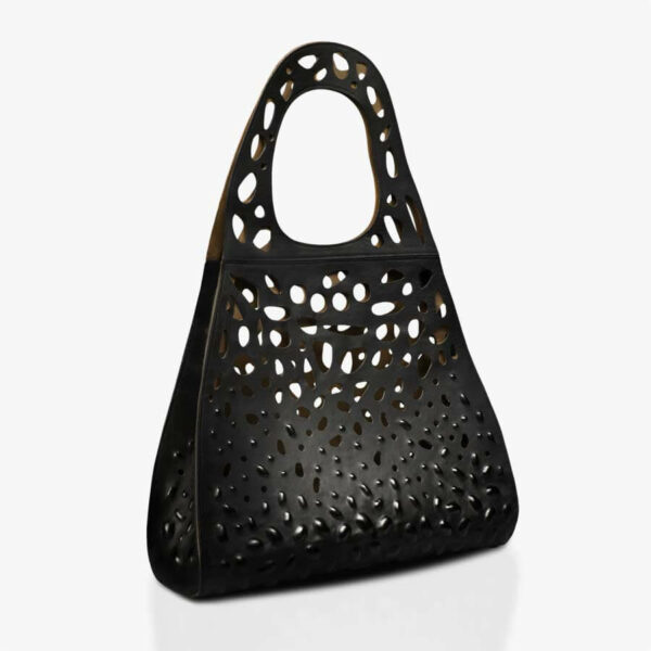 Black oversized leather bag with cut-outs and three-dimensional embossing. SHAROKINA Modification Oversized Bag