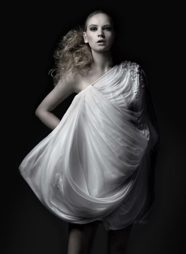 White chiffon dress, one-shouldered, with applique and fringes. SHAROKINA Polymorph