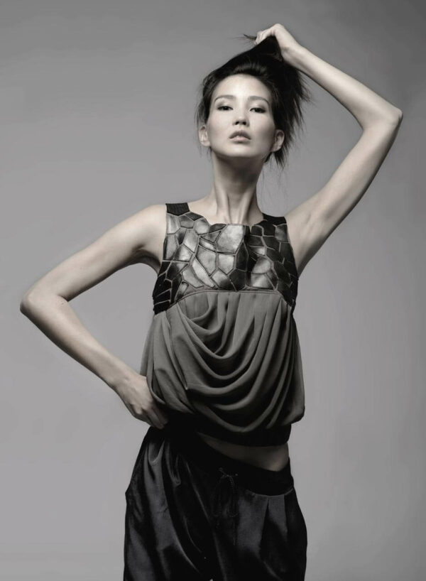 Draped chiffon top with leather appliques and black pants. SHAROKINA All or Nothing