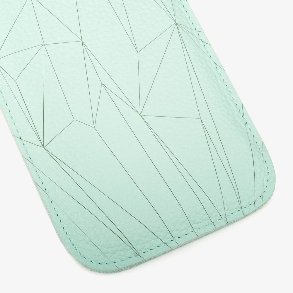 Leather smartphone case in mint with geometric pattern laser engraving. SHAROKINA Cava Polygon