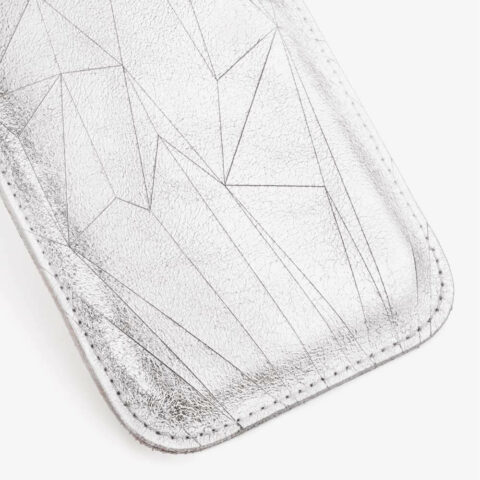 Leather phone case in silver with geometric laser-engraved pattern. SHAROKINA Cava Polygon