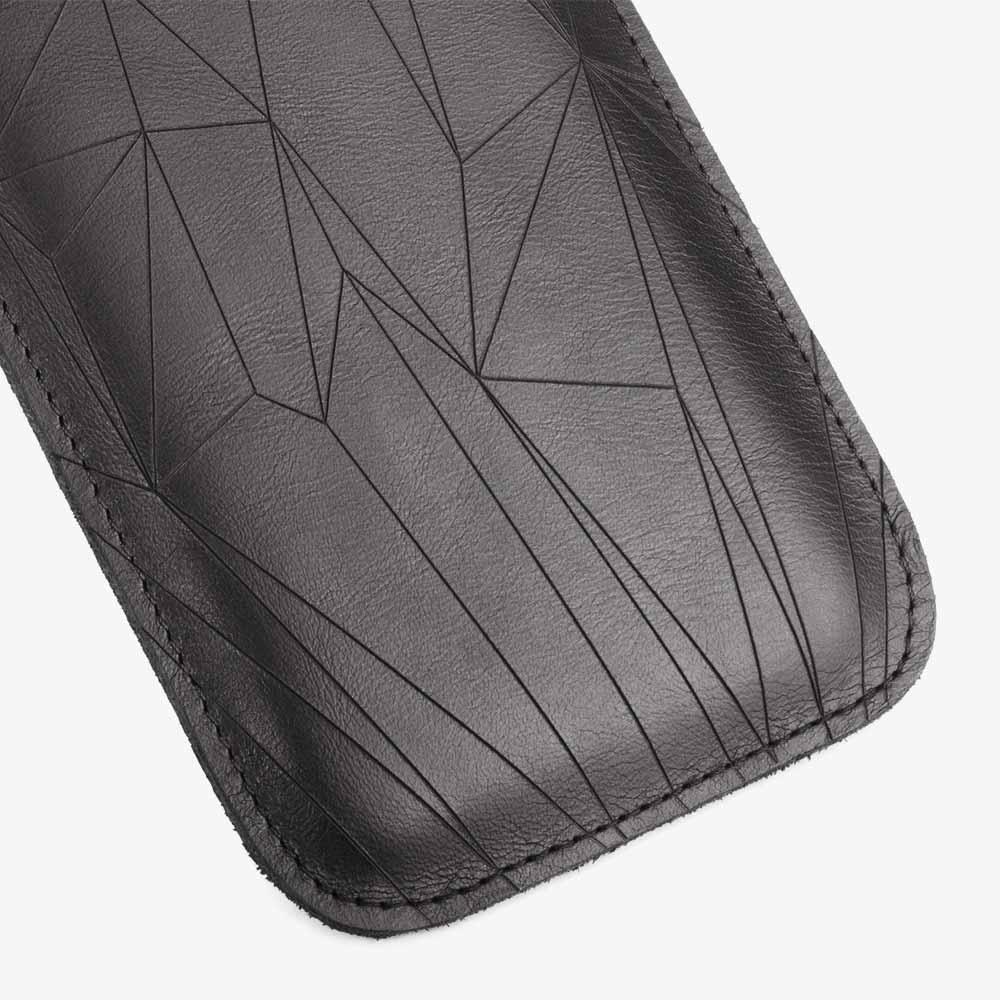 Leather smartphone case in black with geometric pattern laser engraving. SHAROKINA Cava Polygon