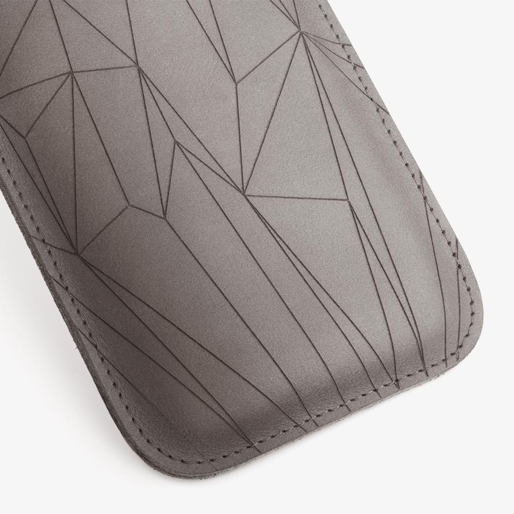 Leather smartphone case in gray with geometric pattern laser engraving. SHAROKINA Cava Polygon