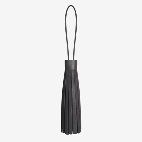 Pendant tassel made of leather in black with LED flashlight. SHAROKINA Seca Shine