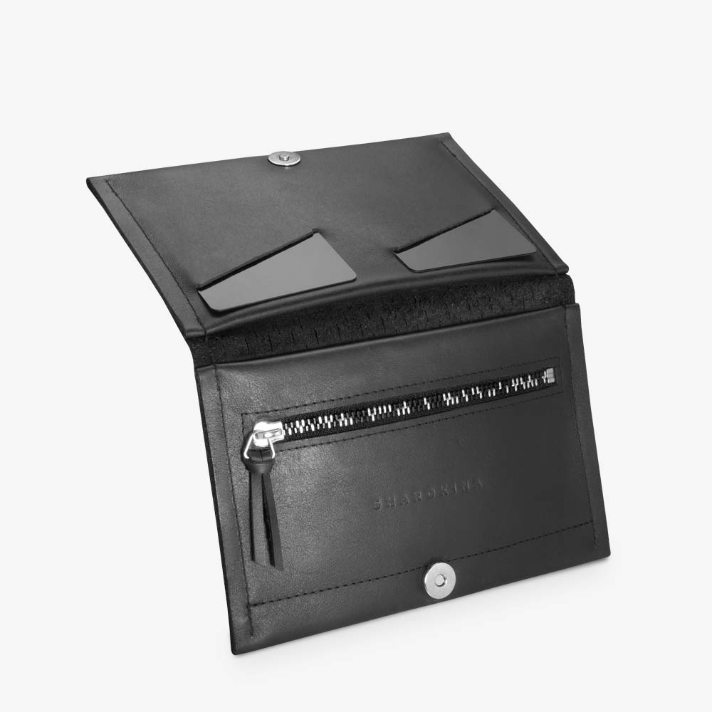Portemonnaie aus Leder in Schwarz für Damen. Geldbörse mit zweifarbigem Metall-Reißverschluss und Lasercuts. SHAROKINA Conda Slice